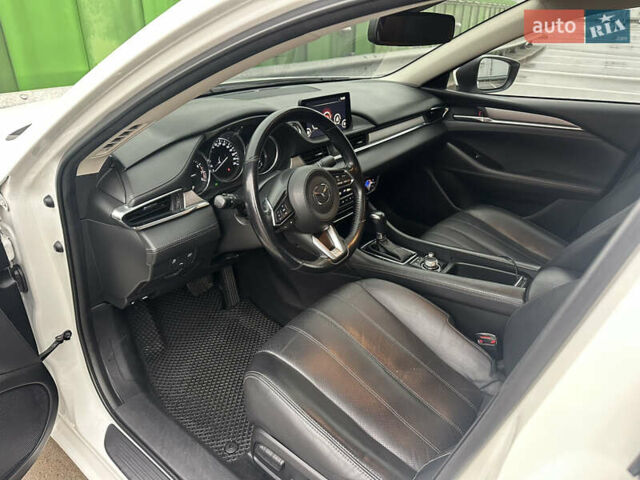 Білий Мазда 6, об'ємом двигуна 2.49 л та пробігом 148 тис. км за 15700 $, фото 18 на Automoto.ua