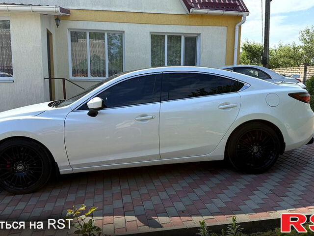 Белый Мазда 6, объемом двигателя 2 л и пробегом 113 тыс. км за 18000 $, фото 6 на Automoto.ua