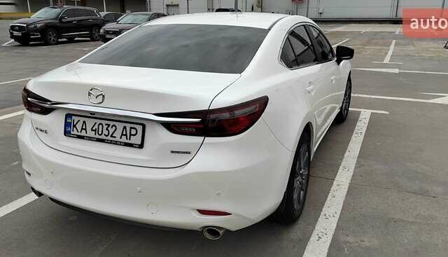 Білий Мазда 6, об'ємом двигуна 2.49 л та пробігом 86 тис. км за 24000 $, фото 9 на Automoto.ua