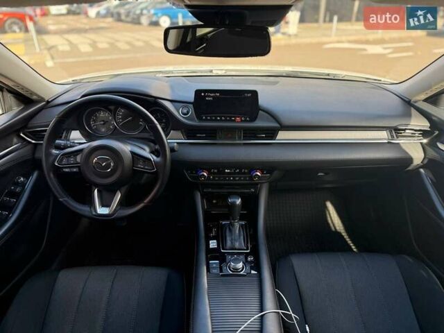 Білий Мазда 6, об'ємом двигуна 2 л та пробігом 134 тис. км за 20490 $, фото 23 на Automoto.ua