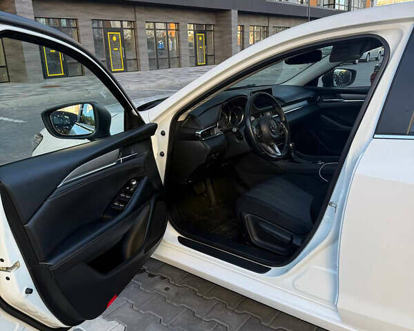 Белый Мазда 6, объемом двигателя 2 л и пробегом 134 тыс. км за 21100 $, фото 9 на Automoto.ua