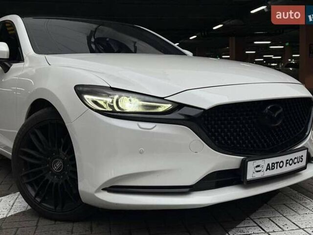 Белый Мазда 6, объемом двигателя 2 л и пробегом 122 тыс. км за 17490 $, фото 1 на Automoto.ua
