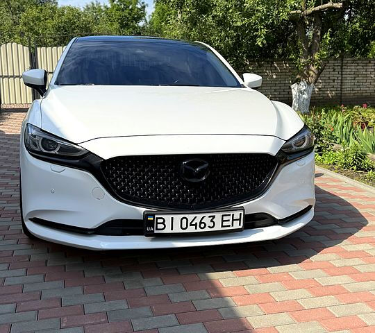 Белый Мазда 6, объемом двигателя 2 л и пробегом 113 тыс. км за 18000 $, фото 1 на Automoto.ua