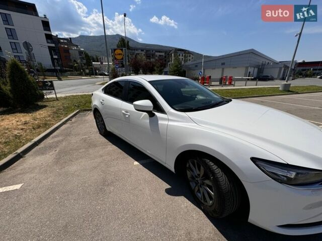 Белый Мазда 6, объемом двигателя 2 л и пробегом 84 тыс. км за 18300 $, фото 2 на Automoto.ua