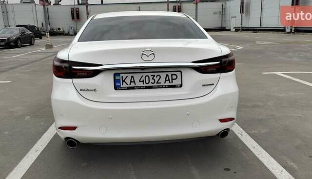 Білий Мазда 6, об'ємом двигуна 2.49 л та пробігом 86 тис. км за 24000 $, фото 18 на Automoto.ua