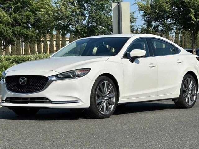Белый Мазда 6, объемом двигателя 2.5 л и пробегом 38 тыс. км за 11000 $, фото 2 на Automoto.ua
