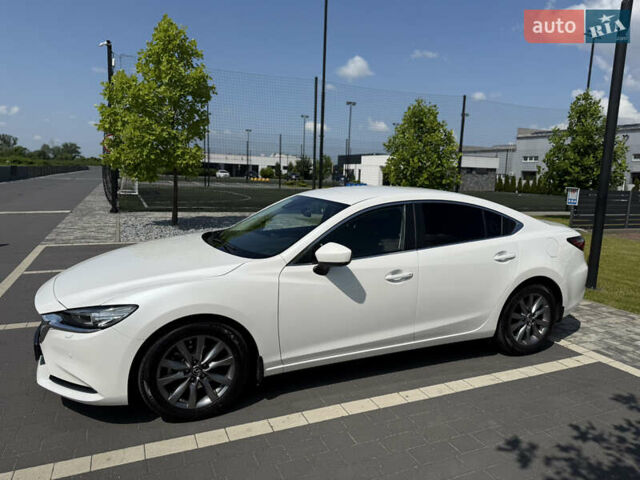 Белый Мазда 6, объемом двигателя 2 л и пробегом 57 тыс. км за 19999 $, фото 2 на Automoto.ua