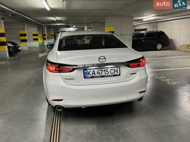 Белый Мазда 6, объемом двигателя 2.49 л и пробегом 21 тыс. км за 31374 $, фото 1 на Automoto.ua