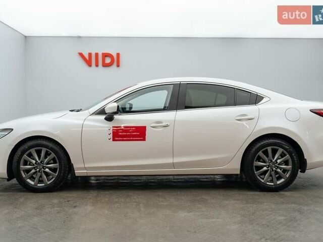 Білий Мазда 6, об'ємом двигуна 2 л та пробігом 30 тис. км за 23228 $, фото 4 на Automoto.ua