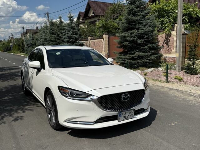 Белый Мазда 6, объемом двигателя 2.5 л и пробегом 60 тыс. км за 22000 $, фото 1 на Automoto.ua