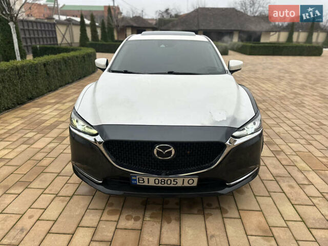 Белый Мазда 6, объемом двигателя 2.49 л и пробегом 114 тыс. км за 16500 $, фото 1 на Automoto.ua