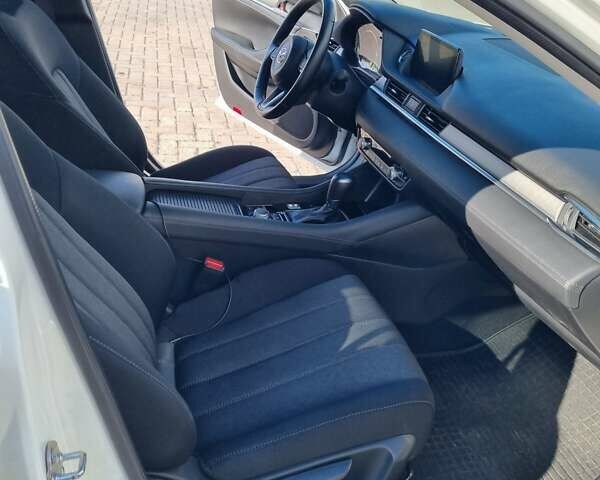 Білий Мазда 6, об'ємом двигуна 2 л та пробігом 51 тис. км за 25500 $, фото 16 на Automoto.ua