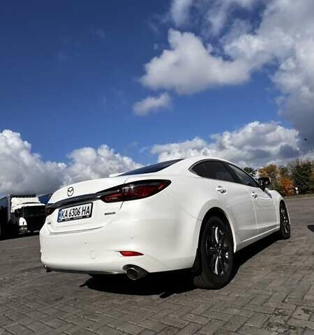 Білий Мазда 6, об'ємом двигуна 2 л та пробігом 51 тис. км за 25500 $, фото 9 на Automoto.ua