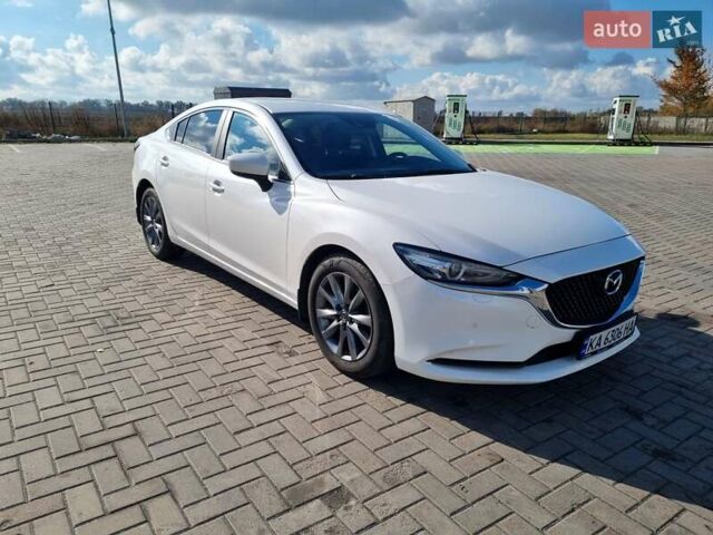Білий Мазда 6, об'ємом двигуна 2 л та пробігом 51 тис. км за 25500 $, фото 11 на Automoto.ua