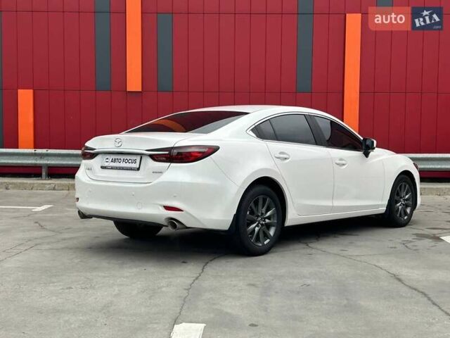 Білий Мазда 6, об'ємом двигуна 2 л та пробігом 22 тис. км за 23490 $, фото 7 на Automoto.ua