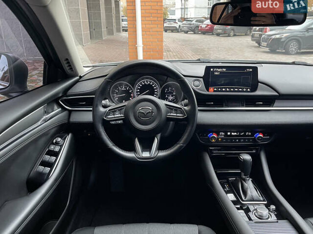 Білий Мазда 6, об'ємом двигуна 2 л та пробігом 22 тис. км за 23400 $, фото 24 на Automoto.ua