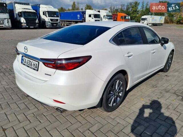 Білий Мазда 6, об'ємом двигуна 2 л та пробігом 51 тис. км за 25500 $, фото 18 на Automoto.ua