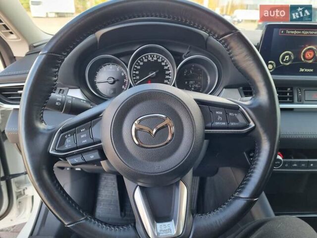 Білий Мазда 6, об'ємом двигуна 2 л та пробігом 51 тис. км за 25500 $, фото 29 на Automoto.ua