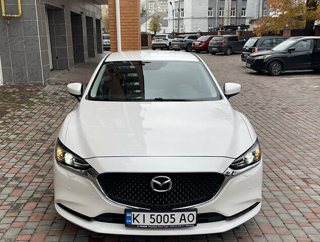 Білий Мазда 6, об'ємом двигуна 2 л та пробігом 22 тис. км за 23400 $, фото 11 на Automoto.ua