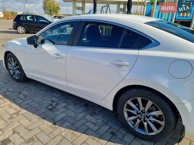 Білий Мазда 6, об'ємом двигуна 2 л та пробігом 51 тис. км за 25500 $, фото 19 на Automoto.ua