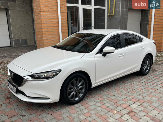 Білий Мазда 6, об'ємом двигуна 2 л та пробігом 22 тис. км за 23400 $, фото 10 на Automoto.ua