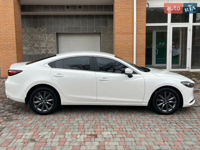 Білий Мазда 6, об'ємом двигуна 2 л та пробігом 22 тис. км за 23400 $, фото 4 на Automoto.ua