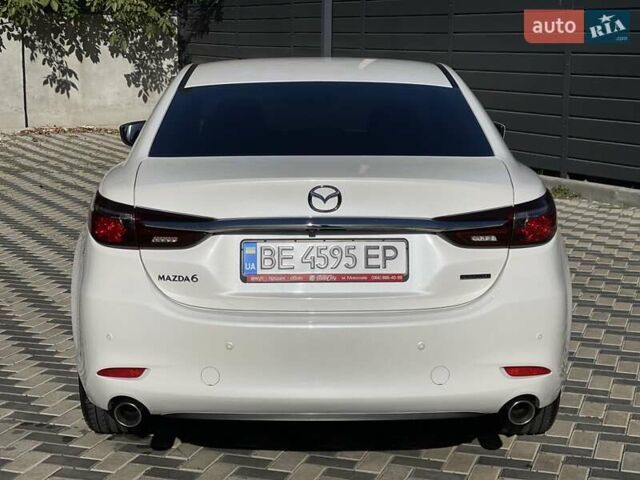 Білий Мазда 6, об'ємом двигуна 2 л та пробігом 18 тис. км за 23900 $, фото 11 на Automoto.ua
