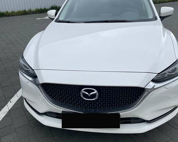 Белый Мазда 6, объемом двигателя 2 л и пробегом 100 тыс. км за 23952 $, фото 1 на Automoto.ua