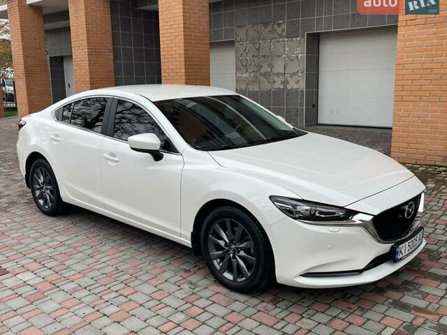 Білий Мазда 6, об'ємом двигуна 2 л та пробігом 22 тис. км за 23400 $, фото 2 на Automoto.ua