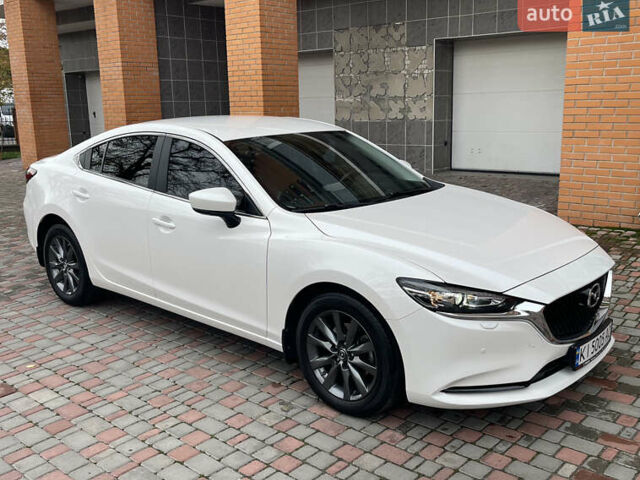 Білий Мазда 6, об'ємом двигуна 2 л та пробігом 22 тис. км за 23400 $, фото 12 на Automoto.ua