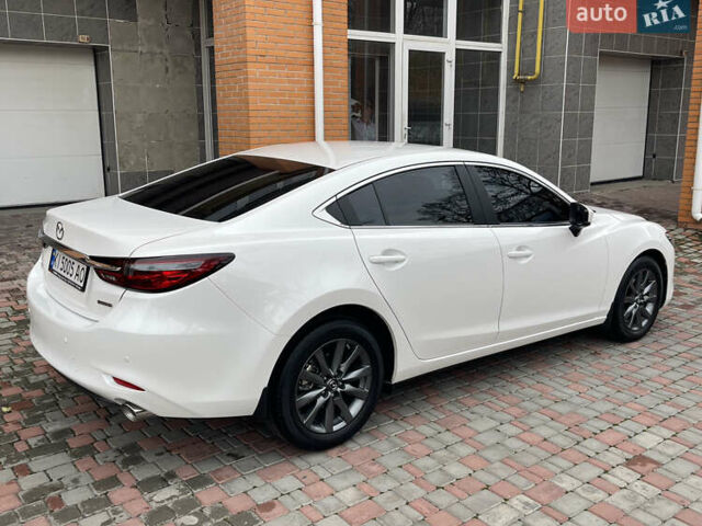 Білий Мазда 6, об'ємом двигуна 2 л та пробігом 22 тис. км за 23400 $, фото 7 на Automoto.ua