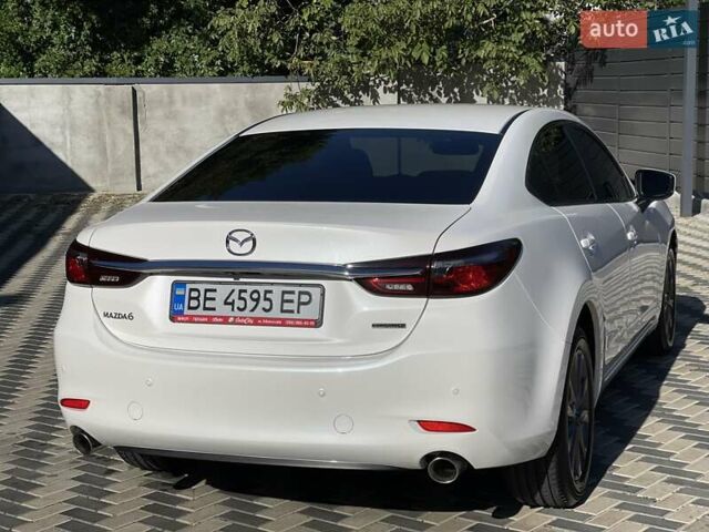 Білий Мазда 6, об'ємом двигуна 2 л та пробігом 18 тис. км за 23900 $, фото 12 на Automoto.ua