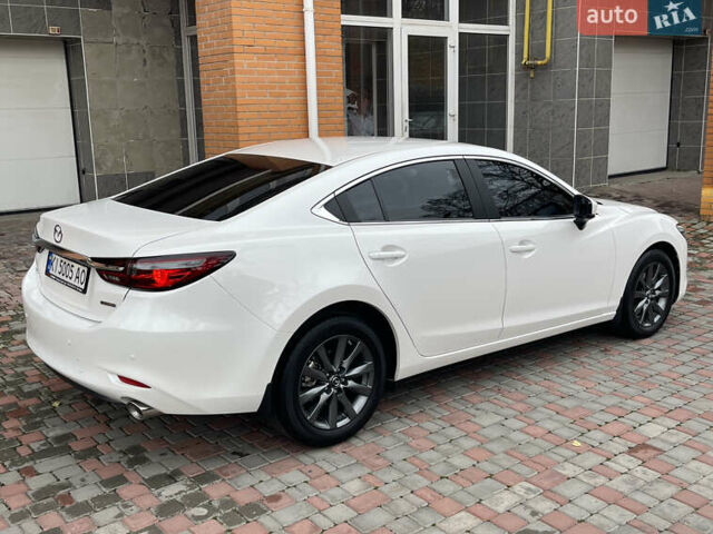 Білий Мазда 6, об'ємом двигуна 2 л та пробігом 22 тис. км за 23400 $, фото 15 на Automoto.ua