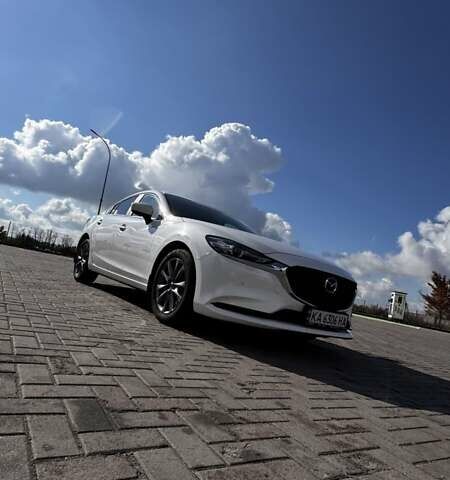 Білий Мазда 6, об'ємом двигуна 2 л та пробігом 51 тис. км за 25500 $, фото 6 на Automoto.ua