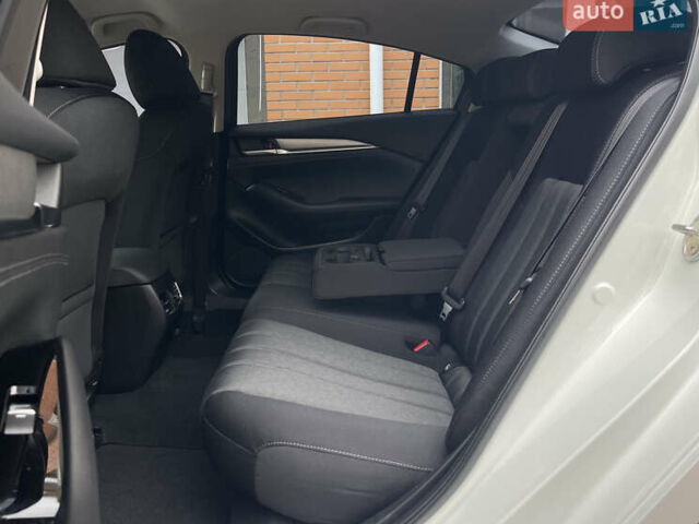 Білий Мазда 6, об'ємом двигуна 2 л та пробігом 22 тис. км за 23400 $, фото 29 на Automoto.ua