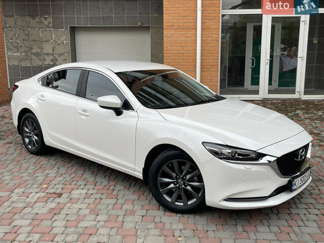Білий Мазда 6, об'ємом двигуна 2 л та пробігом 22 тис. км за 23400 $, фото 9 на Automoto.ua