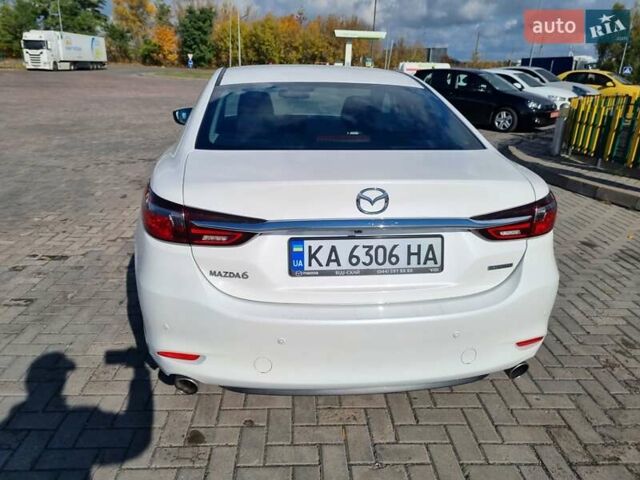 Білий Мазда 6, об'ємом двигуна 2 л та пробігом 51 тис. км за 25500 $, фото 21 на Automoto.ua