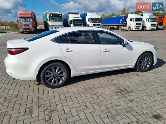 Білий Мазда 6, об'ємом двигуна 2 л та пробігом 51 тис. км за 25500 $, фото 17 на Automoto.ua