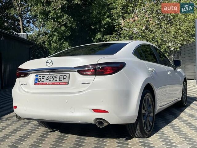 Білий Мазда 6, об'ємом двигуна 2 л та пробігом 18 тис. км за 23900 $, фото 9 на Automoto.ua