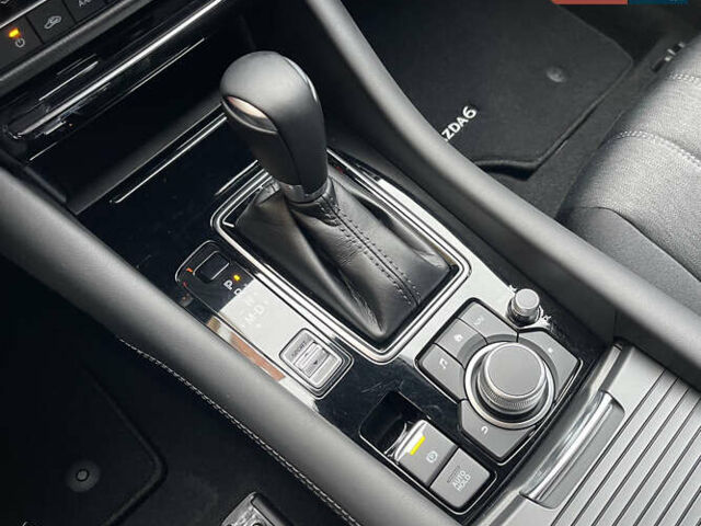 Білий Мазда 6, об'ємом двигуна 2 л та пробігом 22 тис. км за 23400 $, фото 26 на Automoto.ua