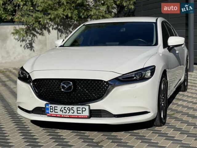 Білий Мазда 6, об'ємом двигуна 2 л та пробігом 18 тис. км за 23900 $, фото 7 на Automoto.ua