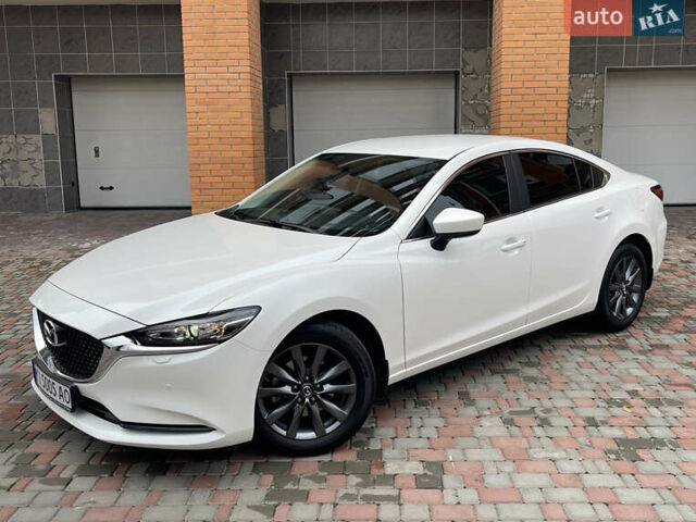 Білий Мазда 6, об'ємом двигуна 2 л та пробігом 22 тис. км за 23400 $, фото 16 на Automoto.ua