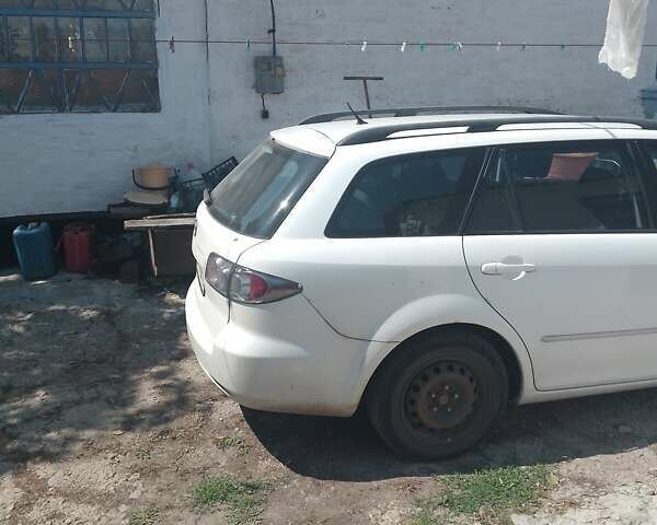 Белый Мазда 6, объемом двигателя 2 л и пробегом 290 тыс. км за 4200 $, фото 6 на Automoto.ua
