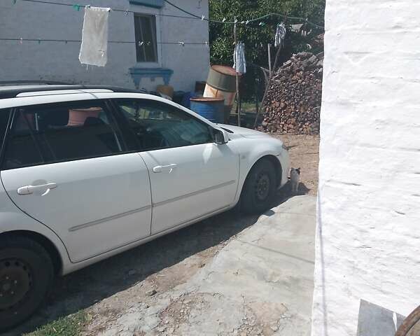 Белый Мазда 6, объемом двигателя 2 л и пробегом 290 тыс. км за 4200 $, фото 2 на Automoto.ua