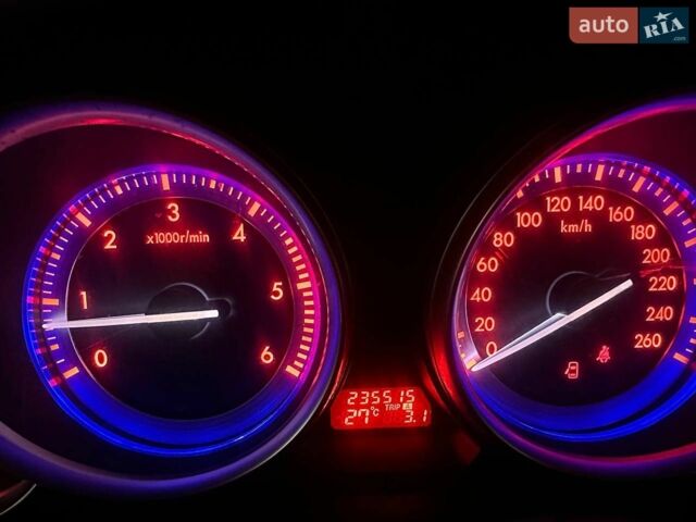 Білий Мазда 6, об'ємом двигуна 2 л та пробігом 235 тис. км за 7500 $, фото 16 на Automoto.ua