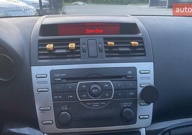 Белый Мазда 6, объемом двигателя 2 л и пробегом 270 тыс. км за 6700 $, фото 13 на Automoto.ua