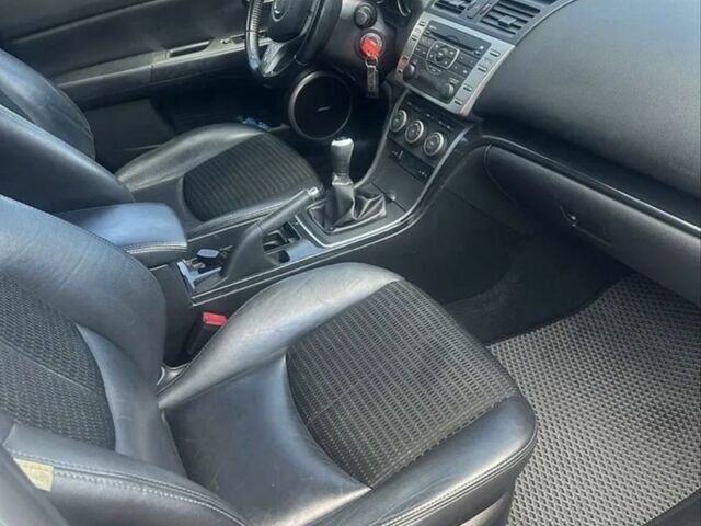 Білий Мазда 6, об'ємом двигуна 2 л та пробігом 235 тис. км за 7800 $, фото 4 на Automoto.ua