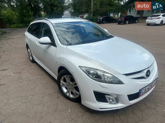 Білий Мазда 6, об'ємом двигуна 2 л та пробігом 235 тис. км за 7500 $, фото 4 на Automoto.ua