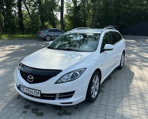 Белый Мазда 6, объемом двигателя 2 л и пробегом 252 тыс. км за 6900 $, фото 4 на Automoto.ua