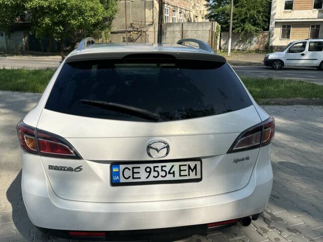 Белый Мазда 6, объемом двигателя 2 л и пробегом 252 тыс. км за 6900 $, фото 2 на Automoto.ua